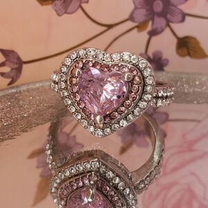 Pink Sapphire surrounded by White Baguette Diamonds on 925 Sterling Silver